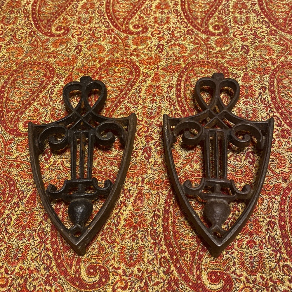 Vintage set of 2 metal shield shaped filigree design trivets